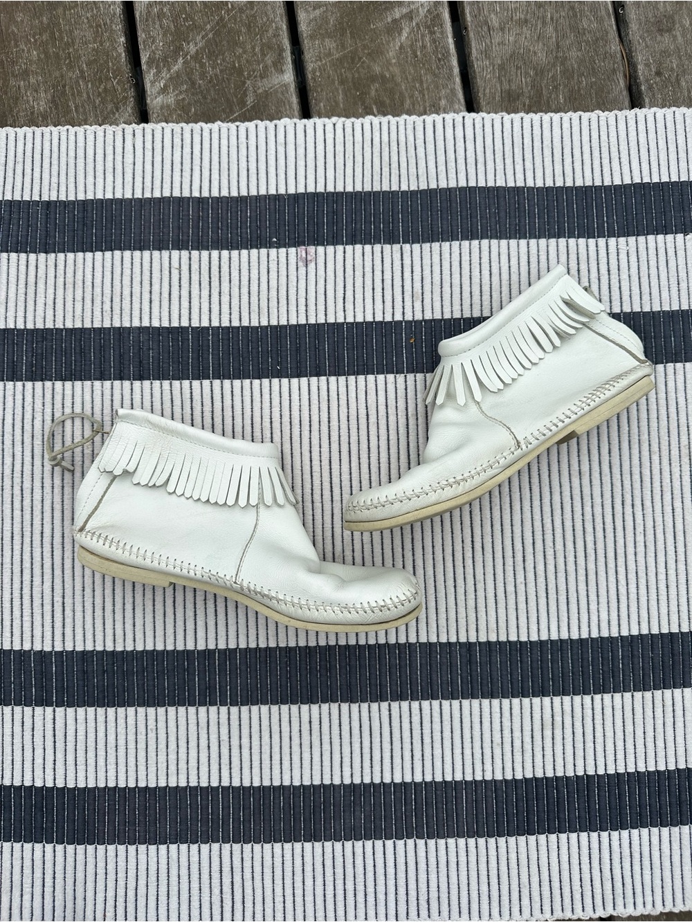Minnetonka White Fringe Ankle Boots